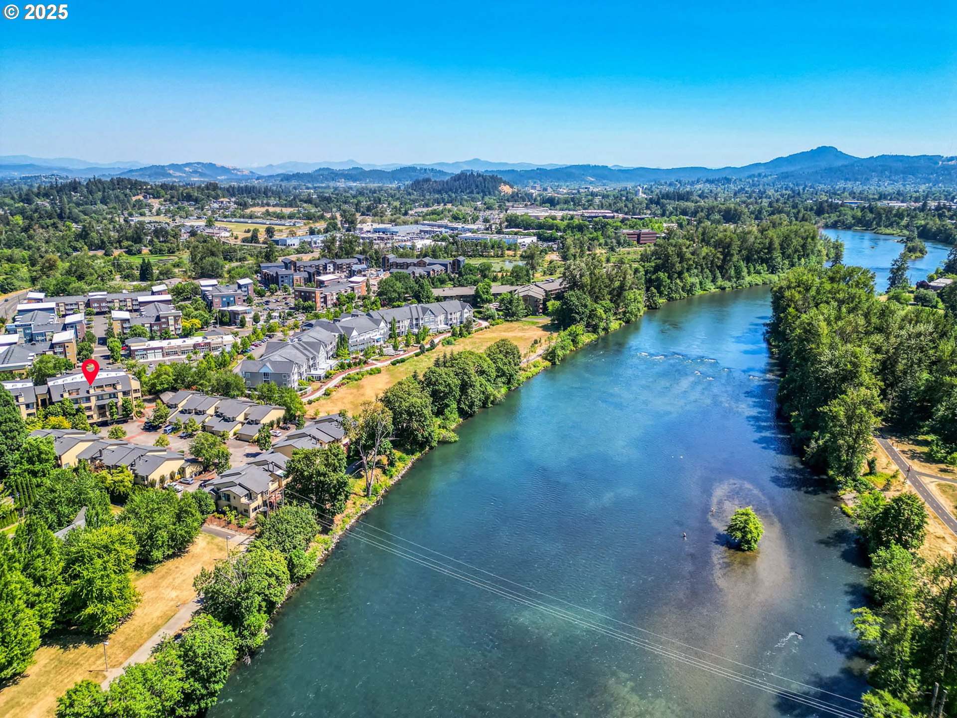 648 Wimbledon Court Eugene, OR 97401 - Photo 43 of 45 a view of a city with mountains in the background