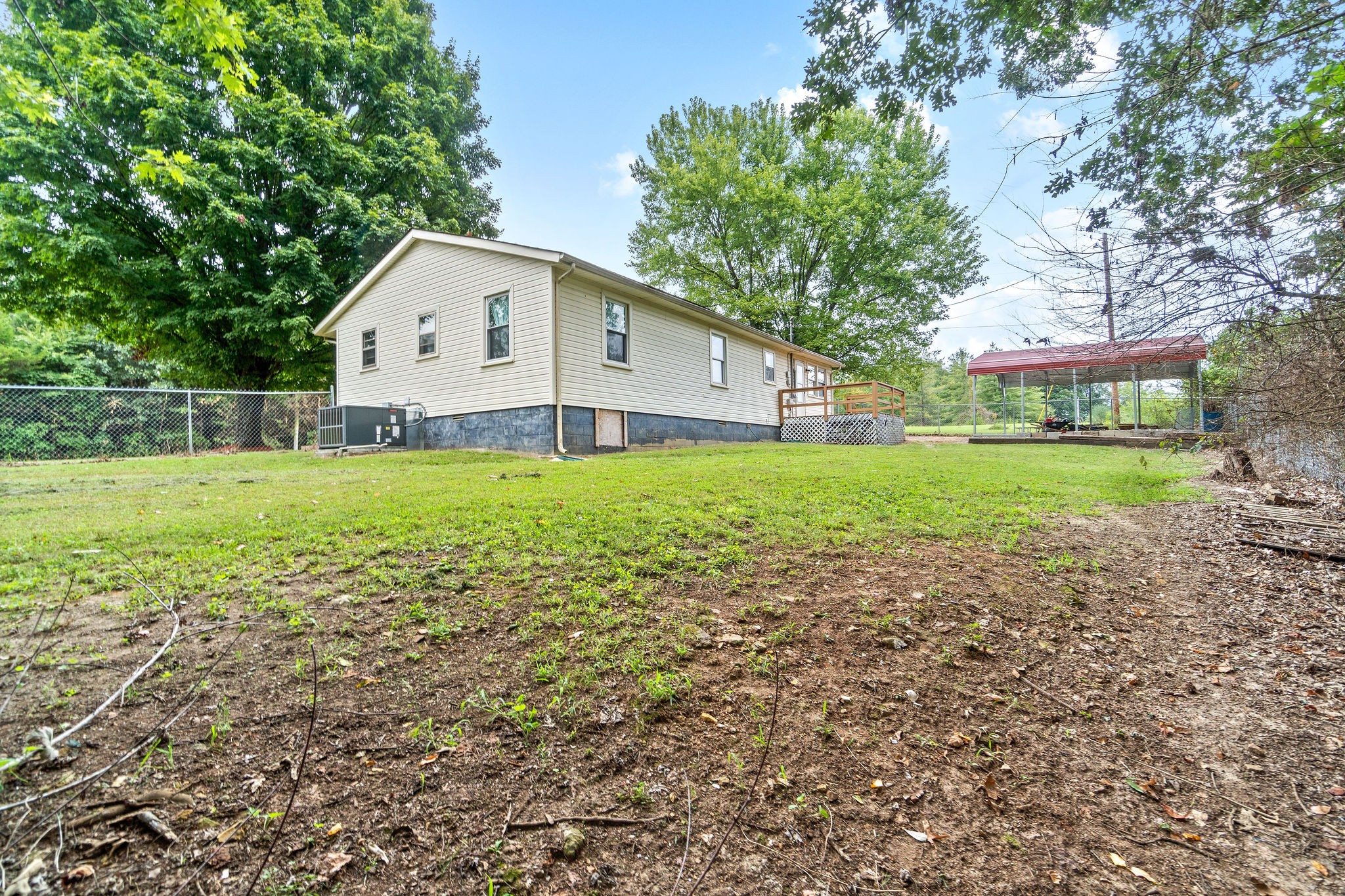 660 Palmyra Road Clarksville, TN 37040 - Photo 31 of 33 a view of a house with a yard and sitting area