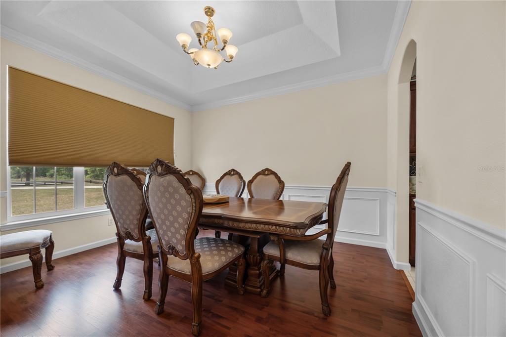 15527 194th Place O'Brien, FL 32071 - Photo 11 of 40 a view of a dining room with furniture and wooden floor
