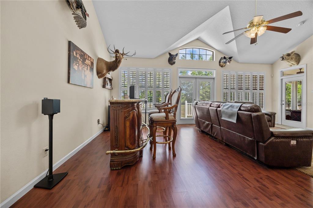 15527 194th Place O'Brien, FL 32071 - Photo 16 of 40 a living room with furniture and a wooden floor