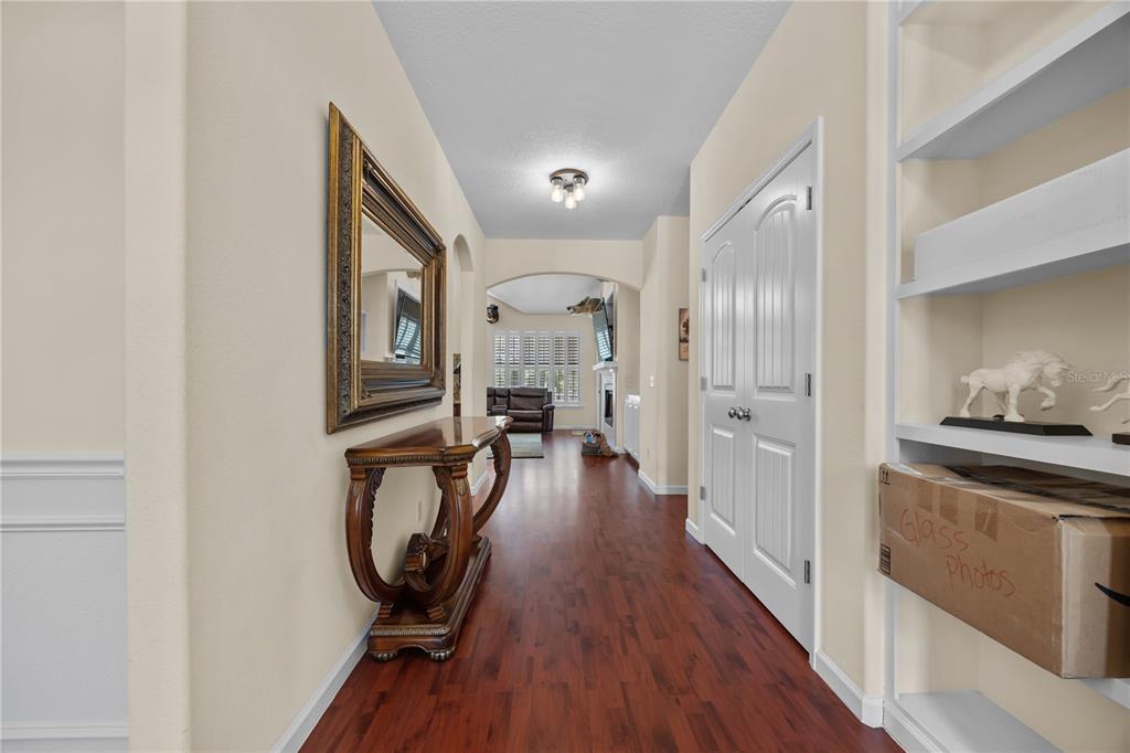 15527 194th Place O'Brien, FL 32071 - Photo 10 of 40 a view of a hallway with wooden floor windows and livingroom view