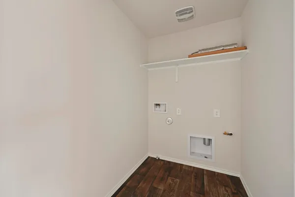 a view of room with racks on the wall