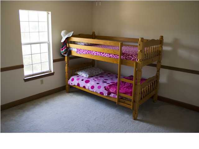 1490 Richardson Road DeFuniak Springs, FL 32433 - Photo 17 of 29 a bedroom with a bed and window
