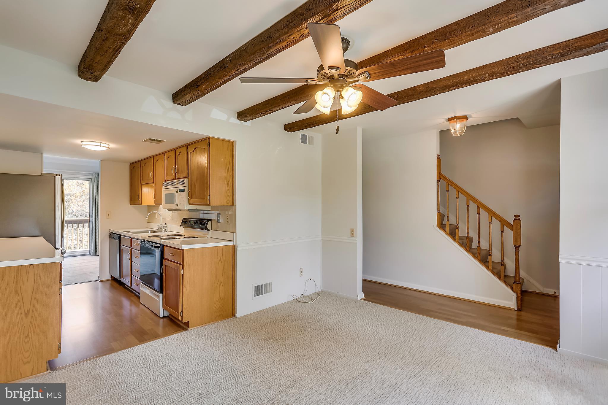 Table space/sitting room adjoins galley kitchen