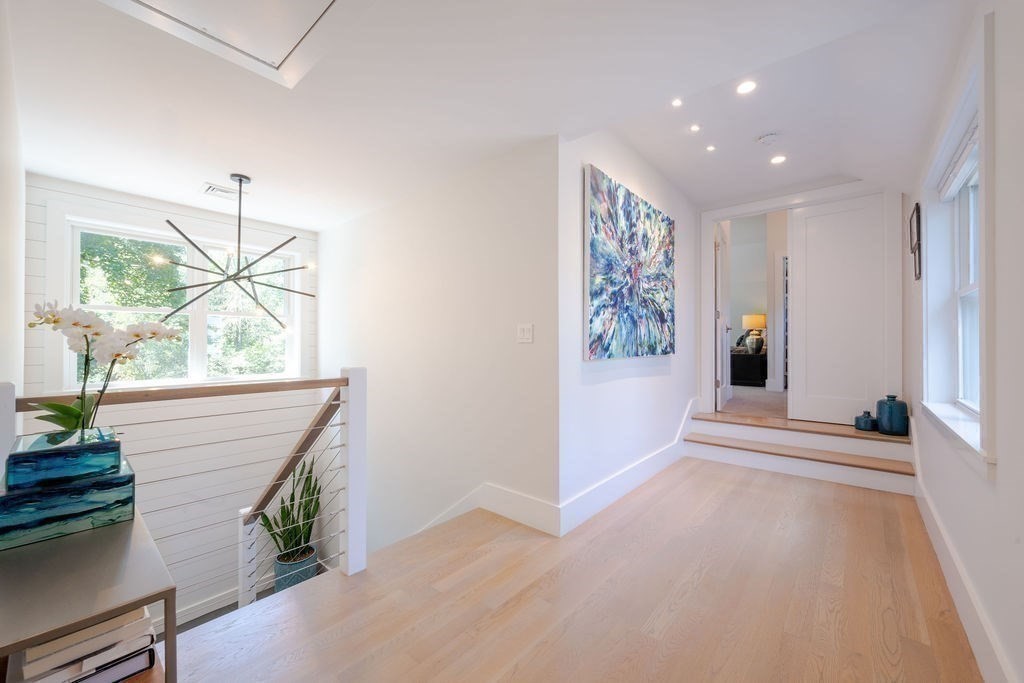 29 Water Street Natick, MA 01760 - Photo 16 of 42 a view of entryway with wooden floor