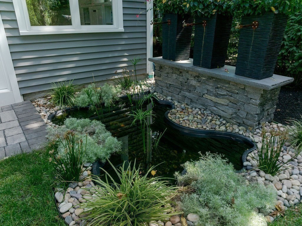 29 Water Street Natick, MA 01760 - Photo 37 of 42 a view of a garden with plants