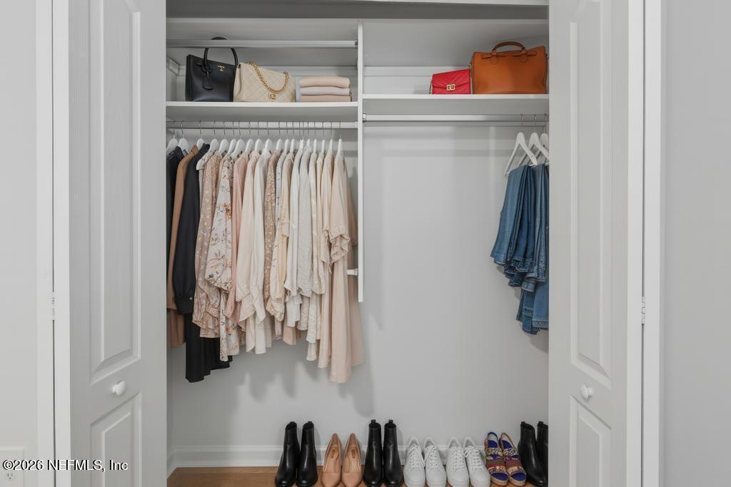 45 Seaport Breeze Road St. Augustine, FL 32095 - Photo 54 of 88 a view of walk in closet with clothes and shoes