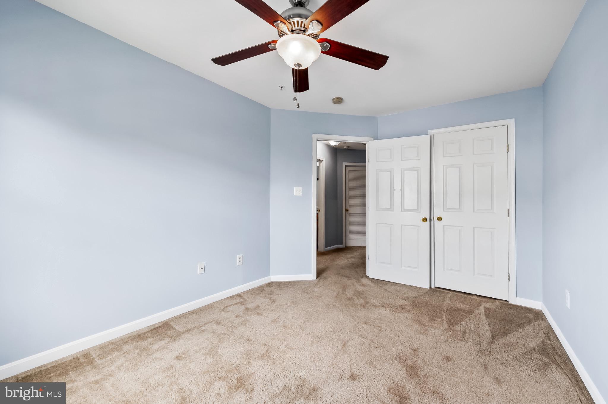 1913 Camelia Court Odenton, MD 21113 - Photo 15 of 26 a view of an empty room and a ceiling fan