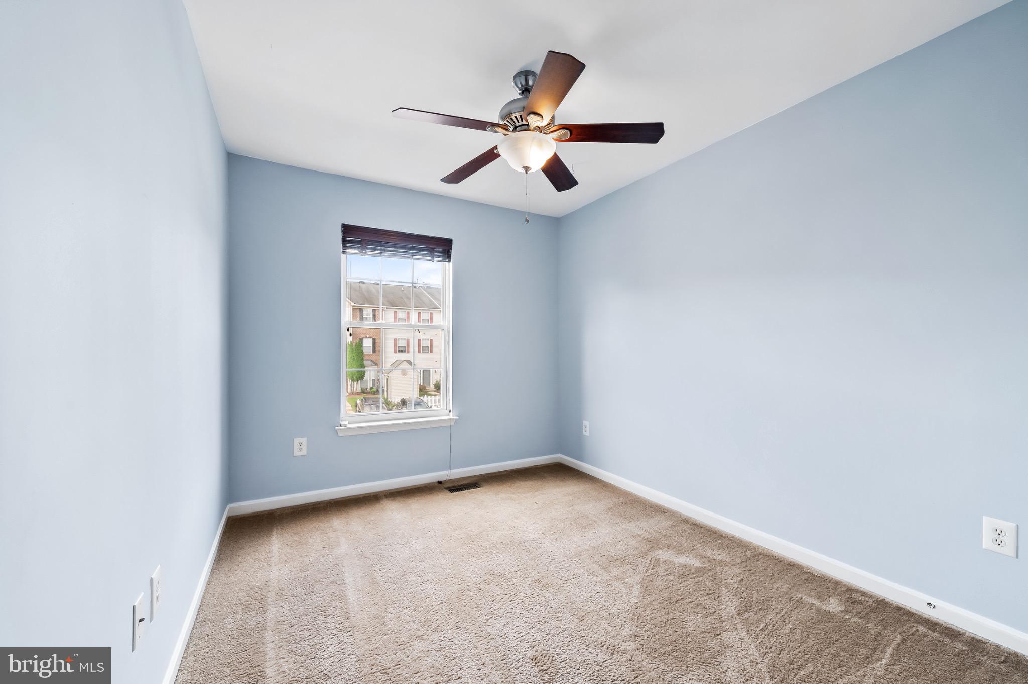 1913 Camelia Court Odenton, MD 21113 - Photo 18 of 26 an empty room with a window and a fan