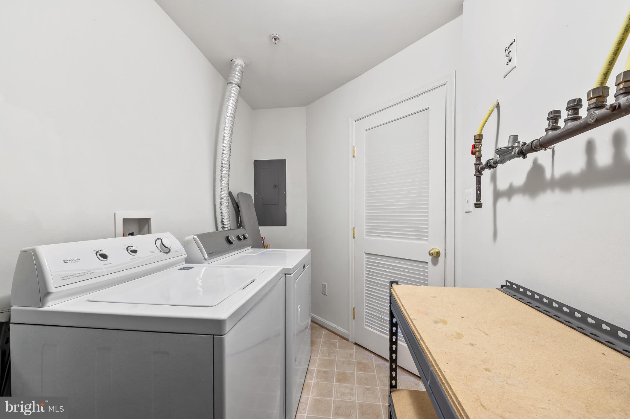 1913 Camelia Court Odenton, MD 21113 - Photo 19 of 26 a utility room with dryer and washer