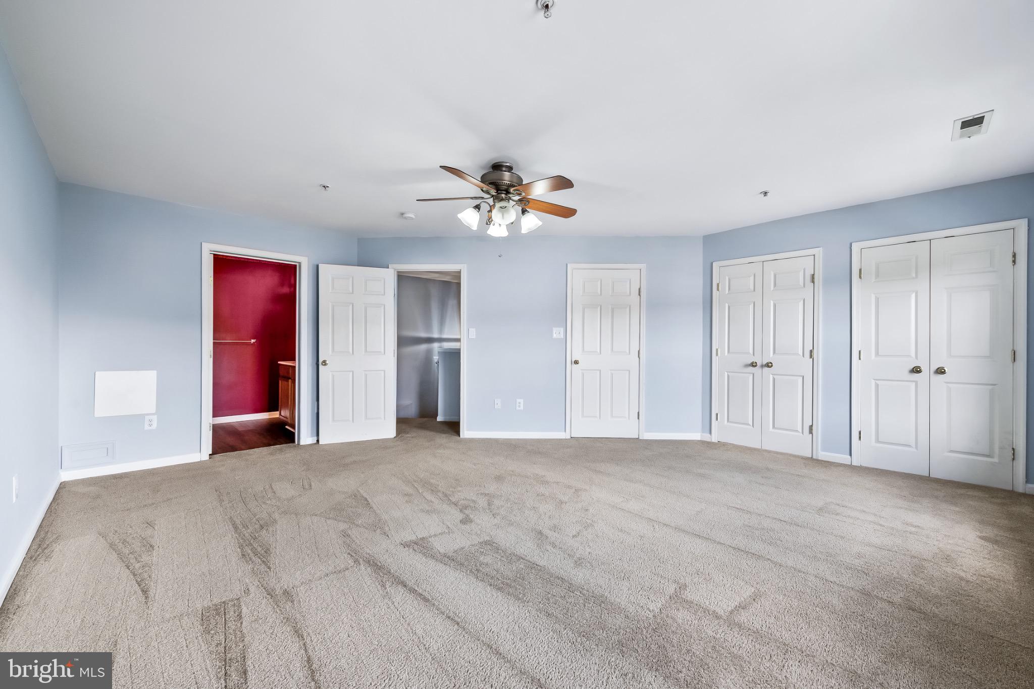 1913 Camelia Court Odenton, MD 21113 - Photo 24 of 26 a view of a livingroom with a chandelier fan