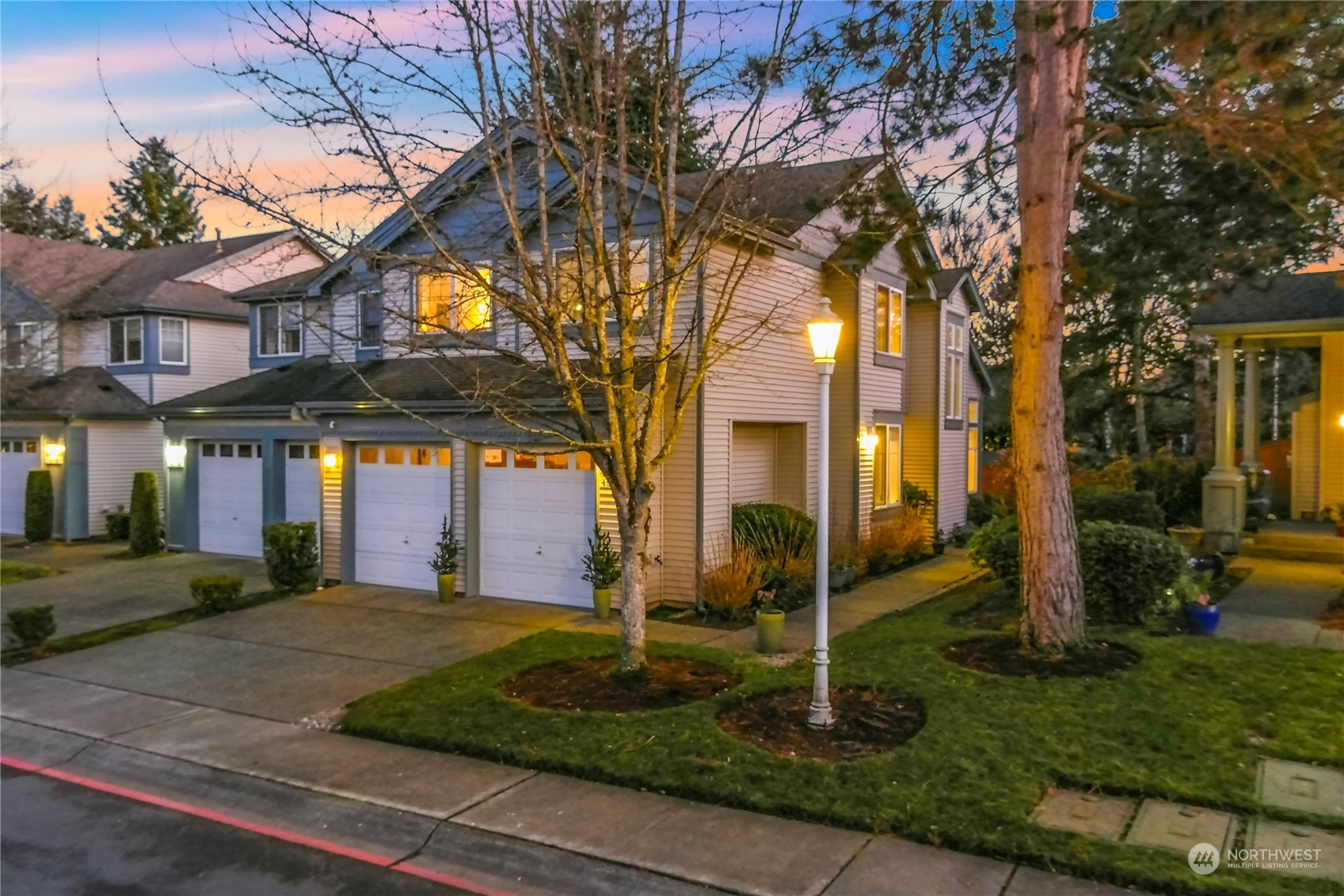 4601 Northeast 6th Court Renton, WA 98059 - Photo 1 of 40 a view of a building with a yard
