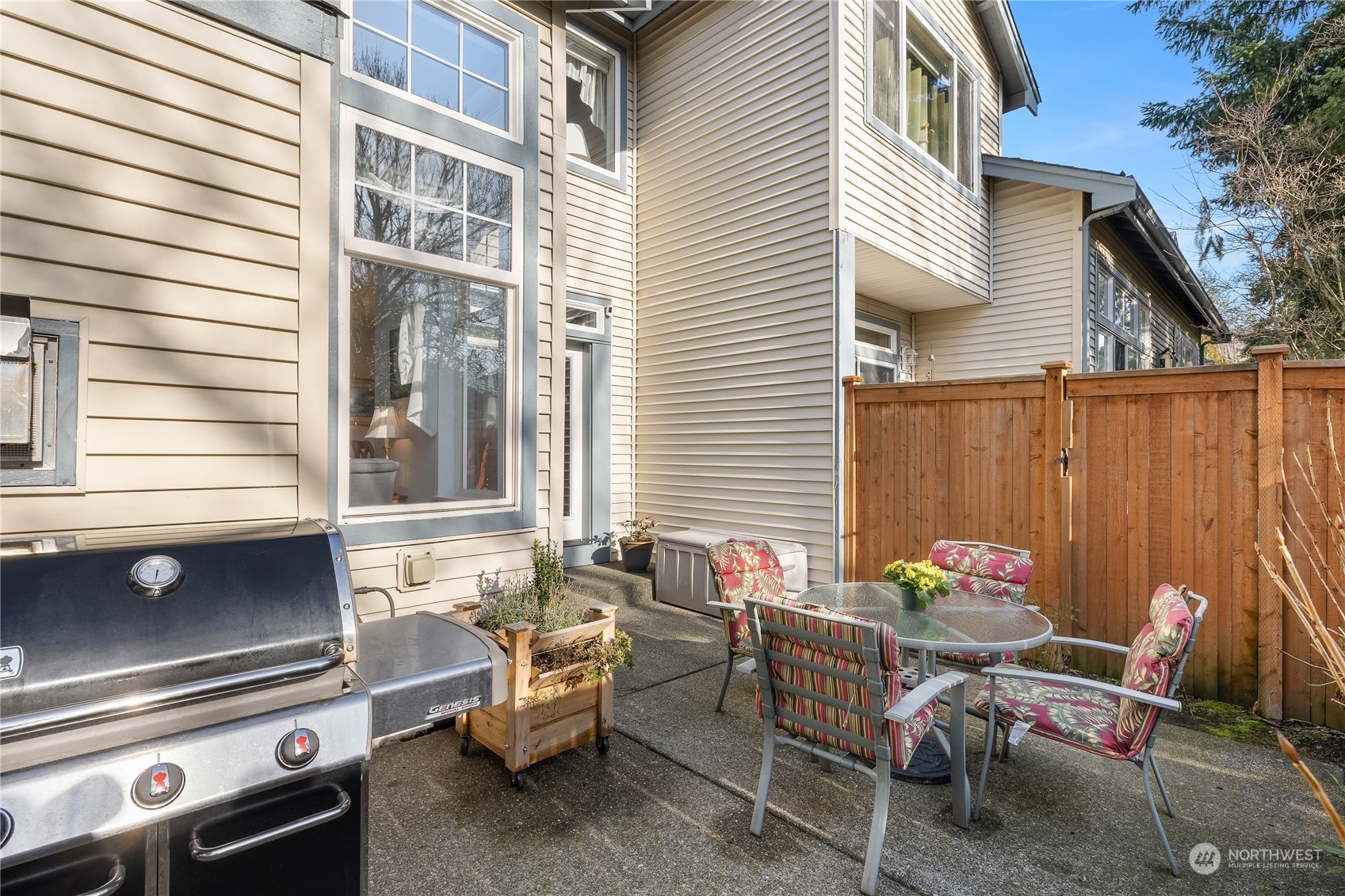 4601 Northeast 6th Court Renton, WA 98059 - Photo 33 of 40 a backyard of a house with outdoor seating