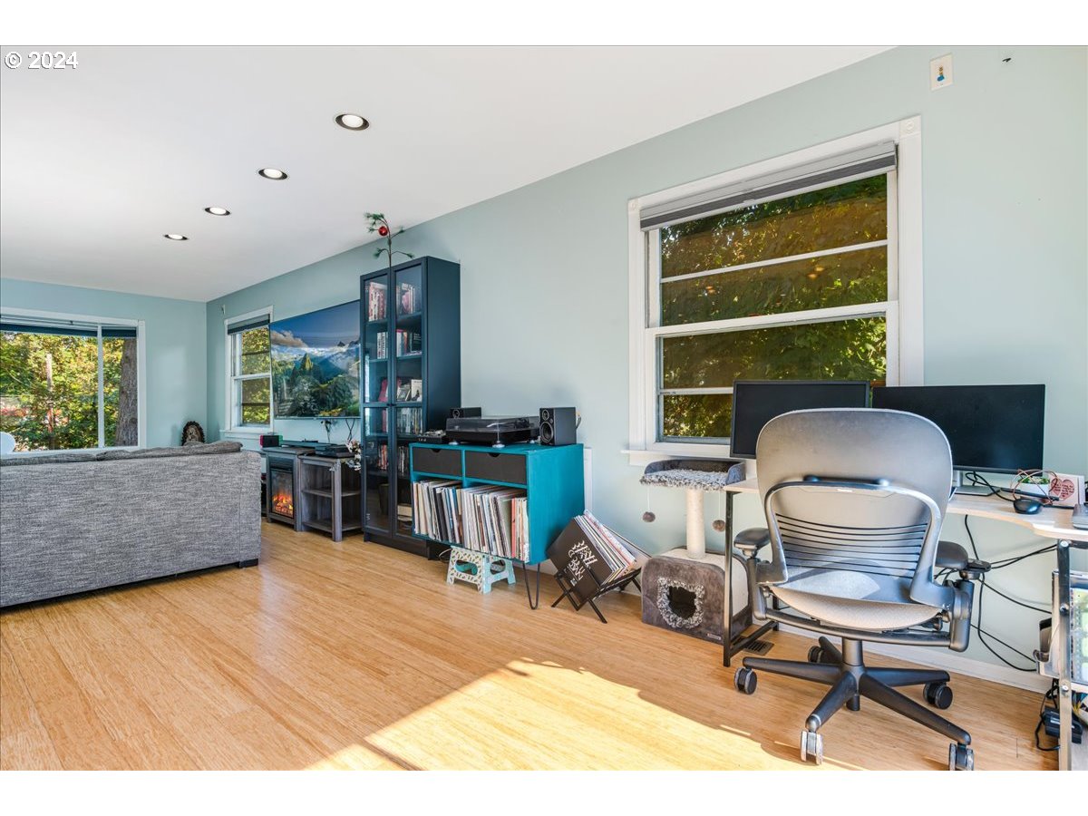2675 Southwest Spring Garden Street Portland, OR 97219 - Photo 11 of 31 a workspace with furniture hardwood and a window