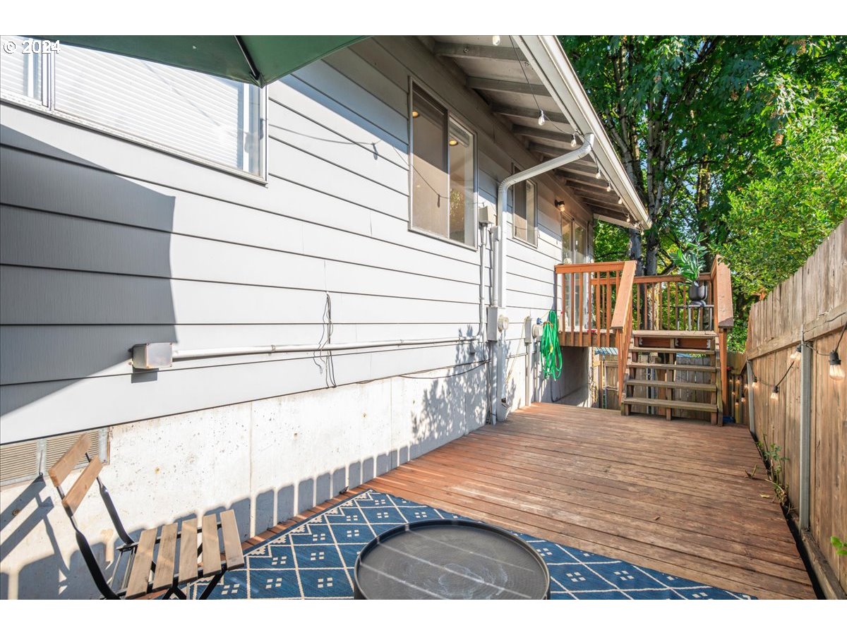 2675 Southwest Spring Garden Street Portland, OR 97219 - Photo 30 of 31 a view of balcony with wooden floor and fence