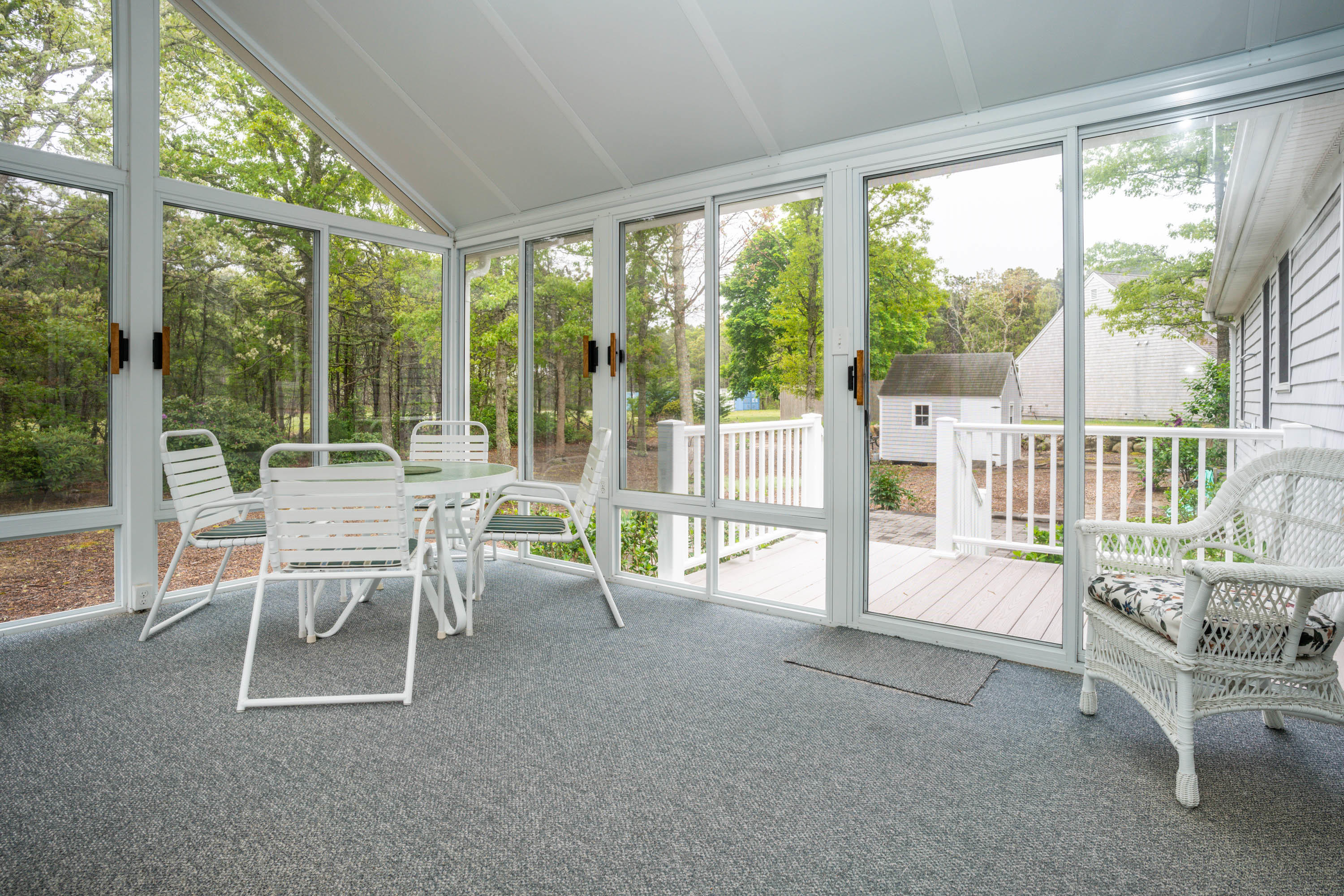 102 Long Hill Road Dennis, MA 02638 - Photo 11 of 24 a dining room with furniture and garden view