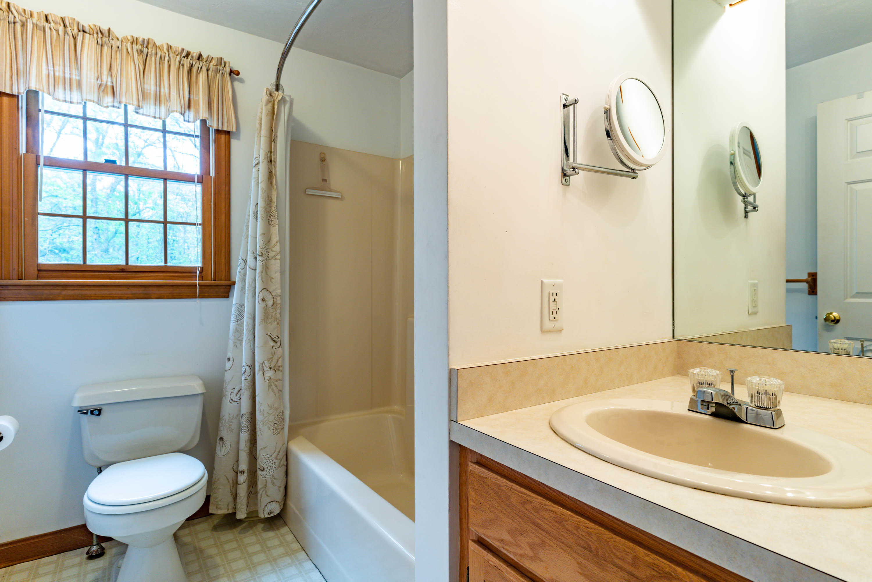 102 Long Hill Road Dennis, MA 02638 - Photo 17 of 24 a bathroom with a sink a toilet and a bathtub