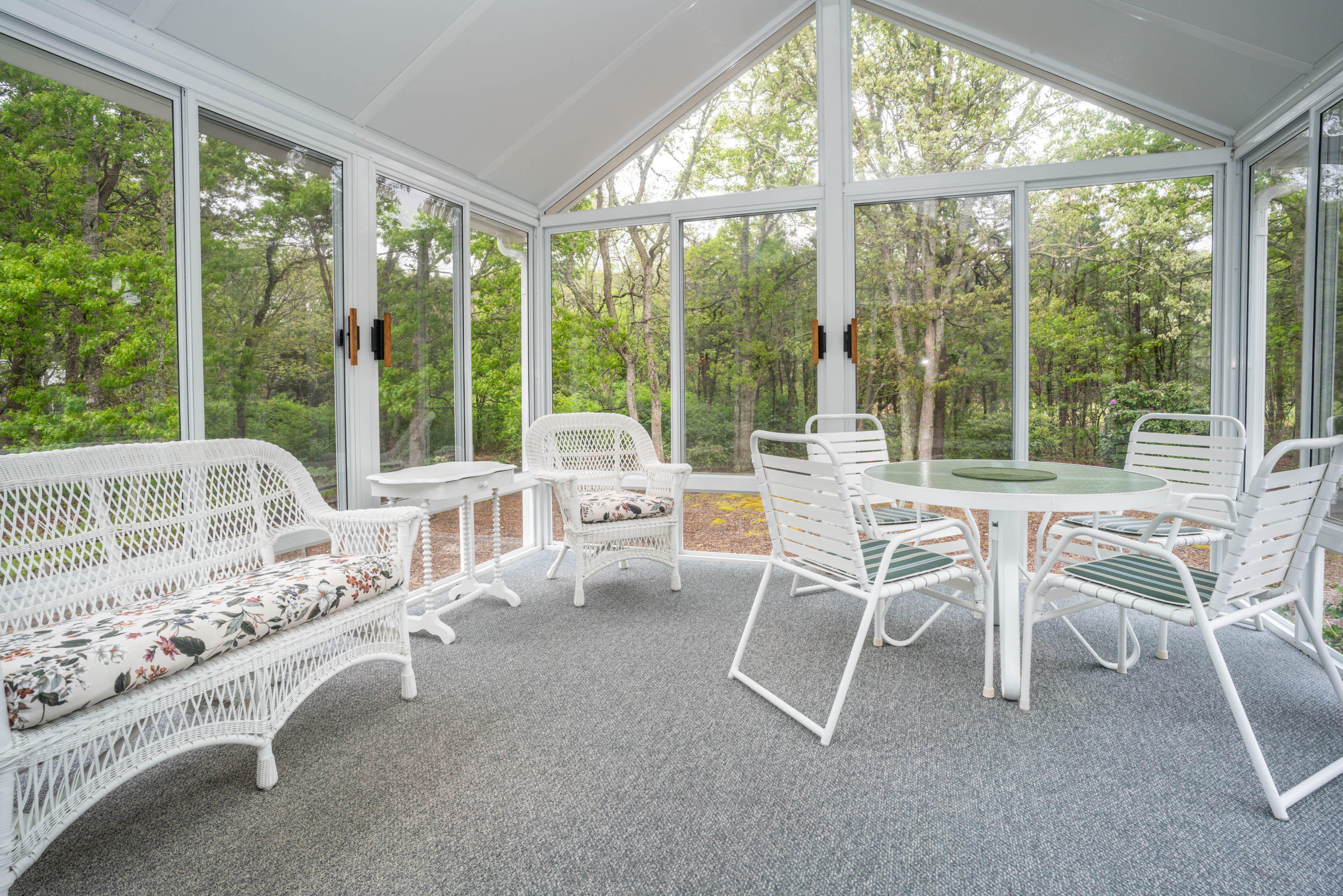 102 Long Hill Road Dennis, MA 02638 - Photo 10 of 24 a dining room with furniture and large windows