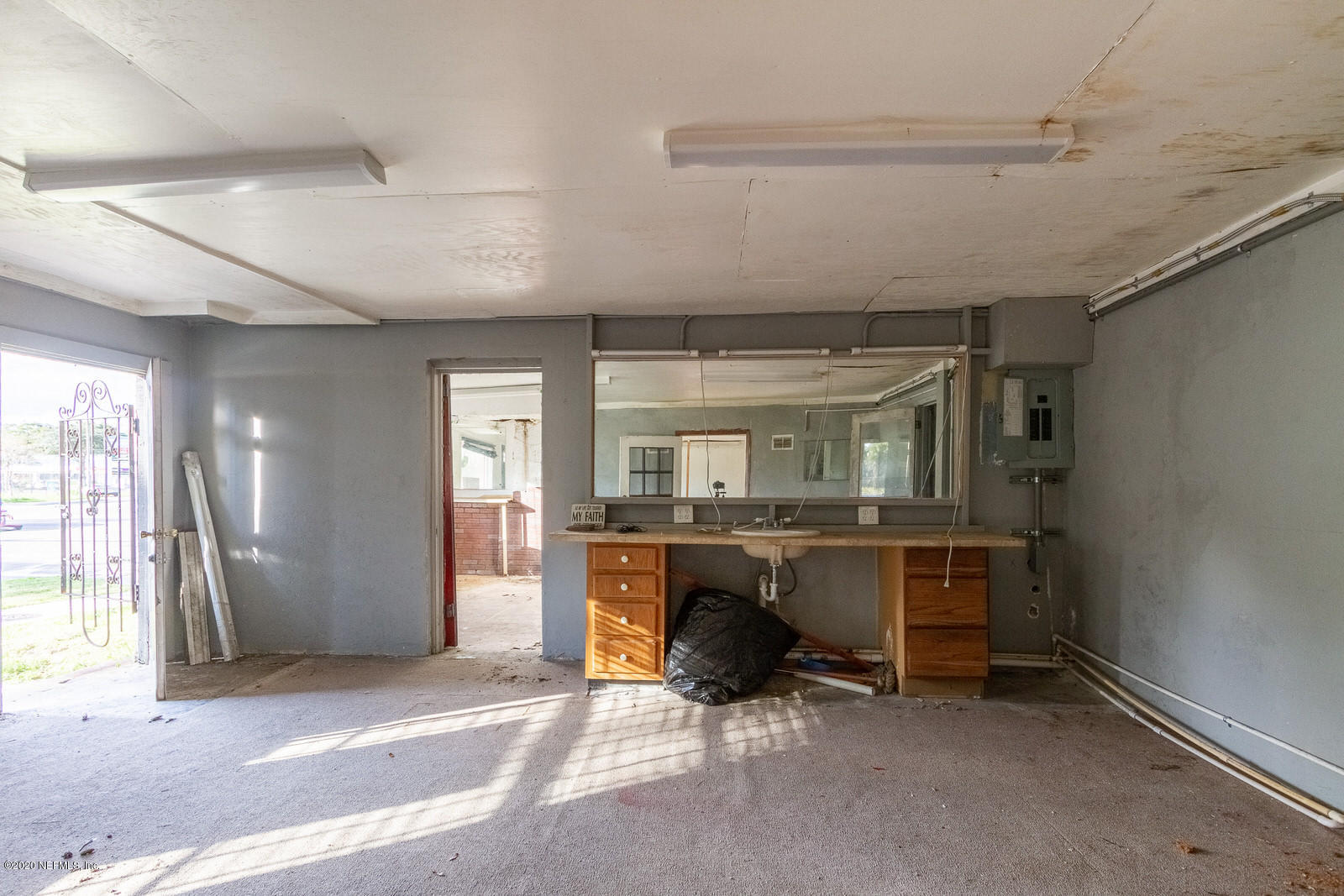2905 Moncrief Road Jacksonville, FL 32209 - Photo 42 of 82 a room with furniture a window and couch
