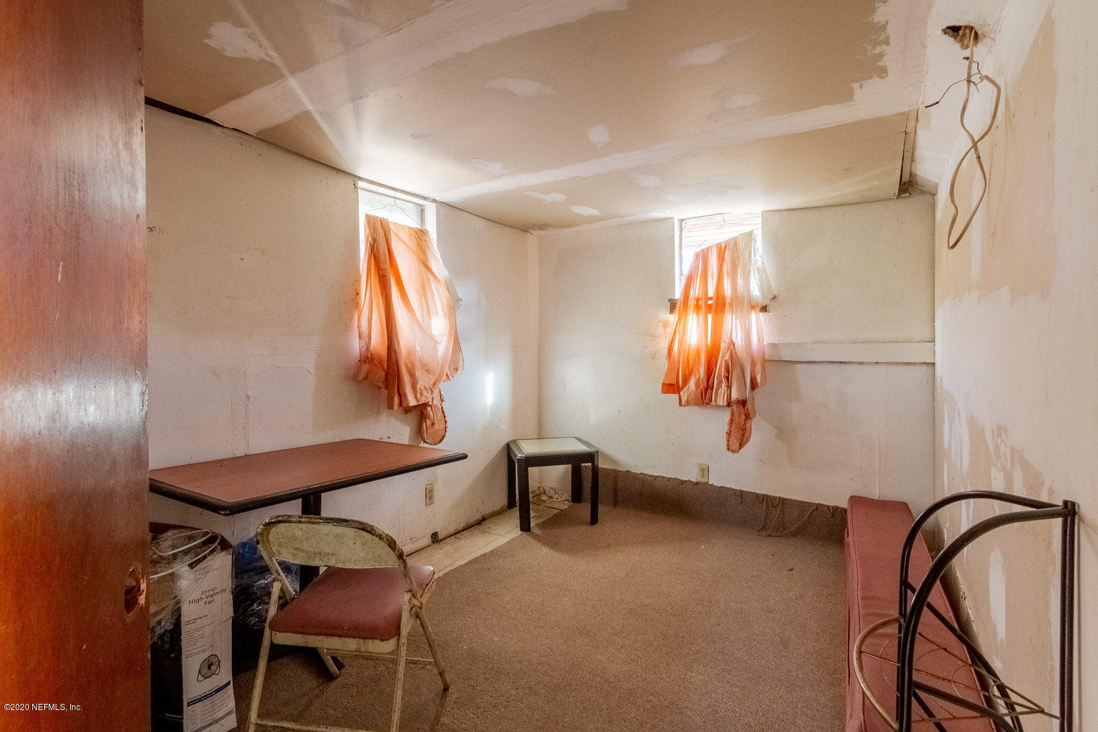 2905 Moncrief Road Jacksonville, FL 32209 - Photo 65 of 82 a room with a chair and windows