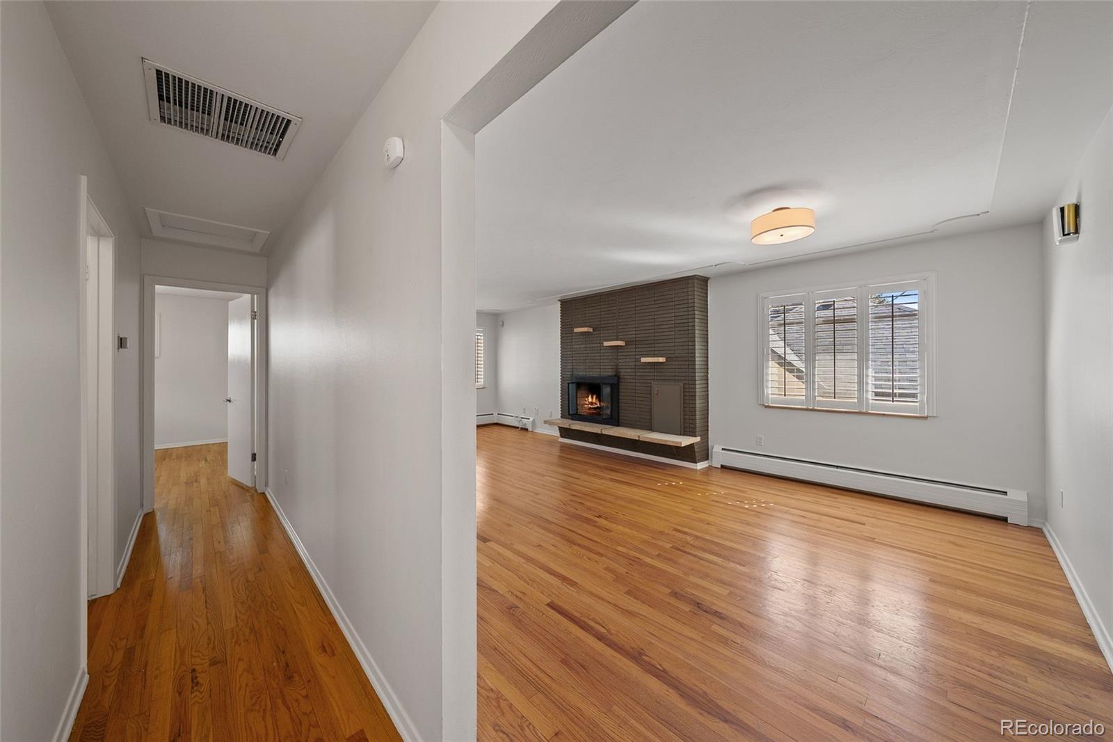 3045 Stuart Street Denver, CO 80212 - Photo 11 of 41 wooden floor in an empty room with a gallery