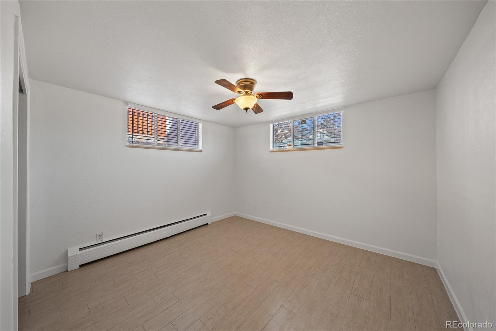 3045 Stuart Street Denver, CO 80212 - Photo 29 of 41 an empty room with a window
