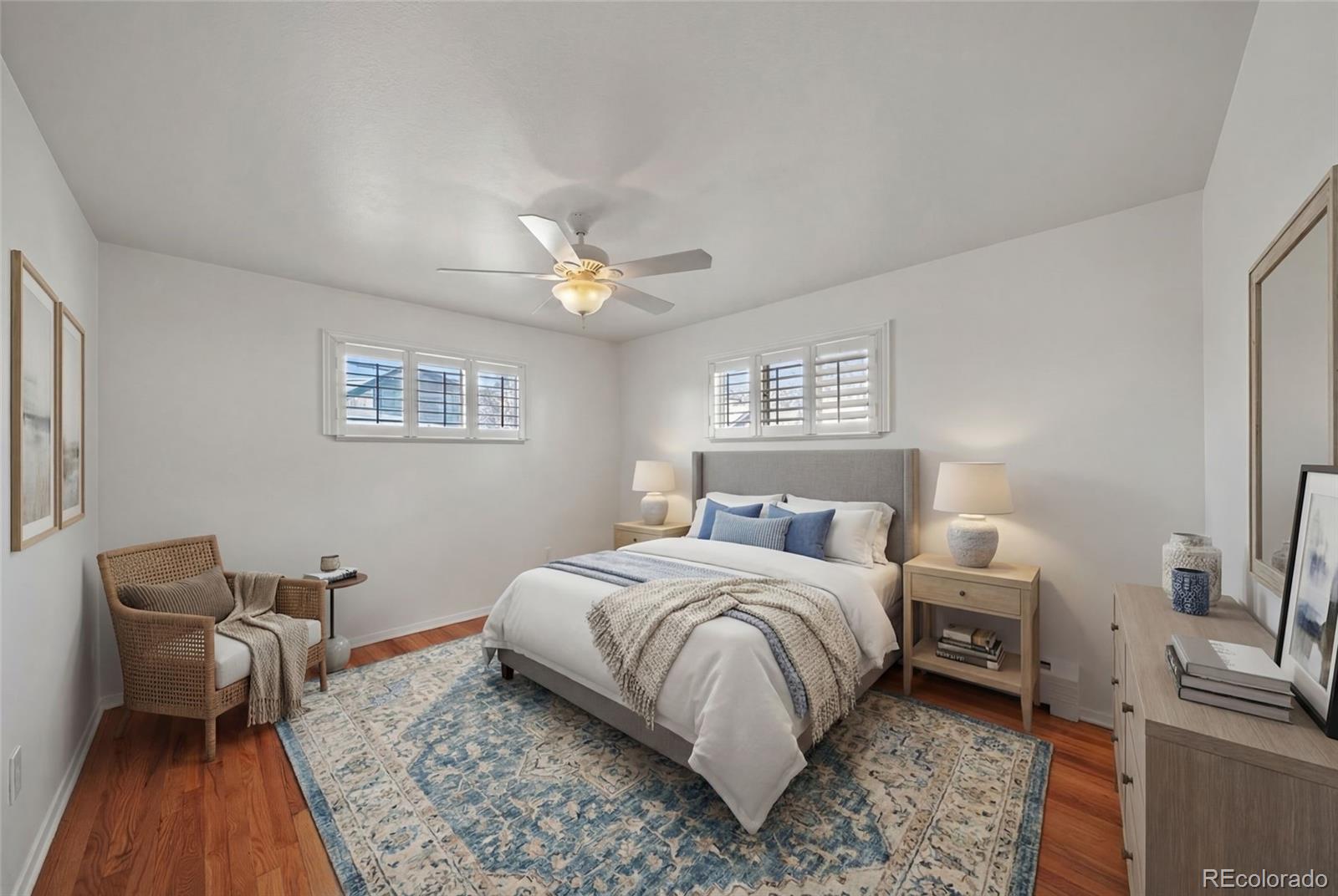 3045 Stuart Street Denver, CO 80212 - Photo 7 of 41 a bedroom with a bed and a couch