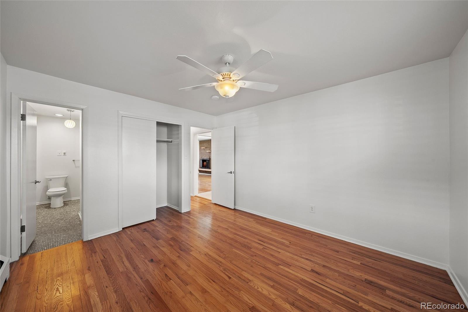 3045 Stuart Street Denver, CO 80212 - Photo 8 of 41 a view of empty room with wooden floor