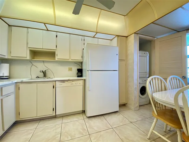 a utility room with cabinets