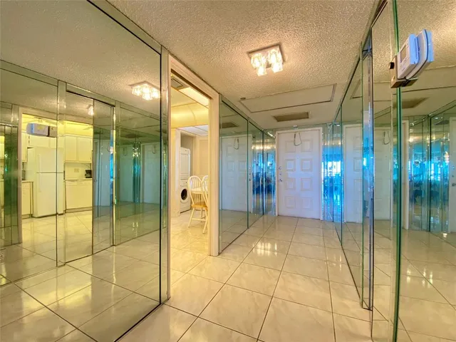 a bathroom with a shower and a sink