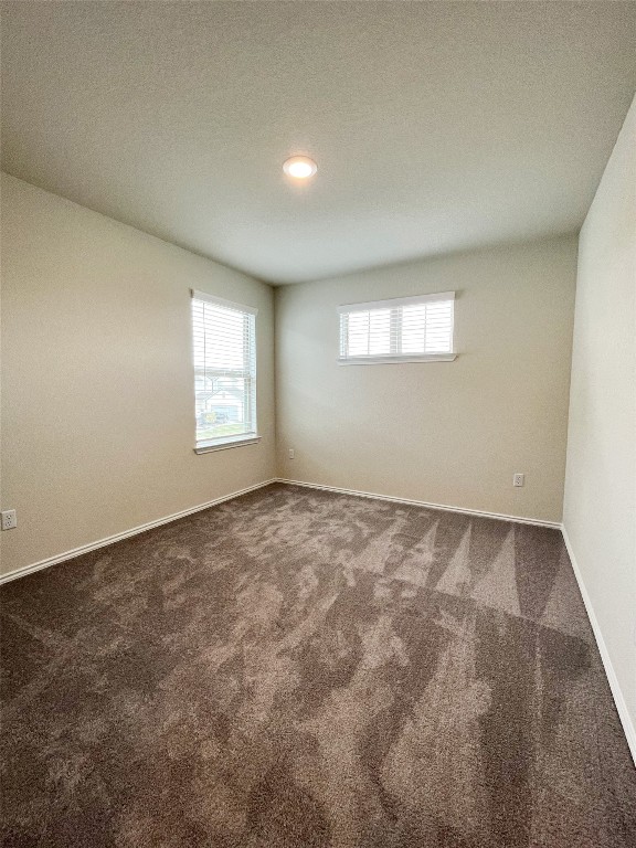 54 Pacific Loon Street Leander, TX 78641 - Photo 17 of 27 an empty room with windows