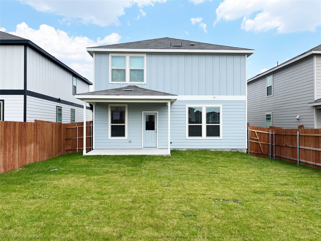 54 Pacific Loon Street Leander, TX 78641 - Photo 22 of 27 a view of a house with a yard and a large tree