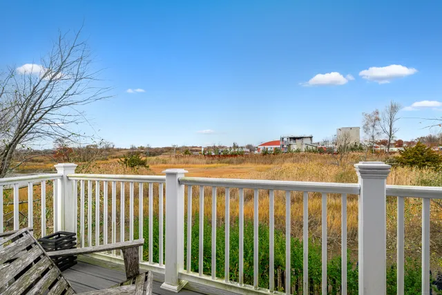 a view of a balcony with an ocean view