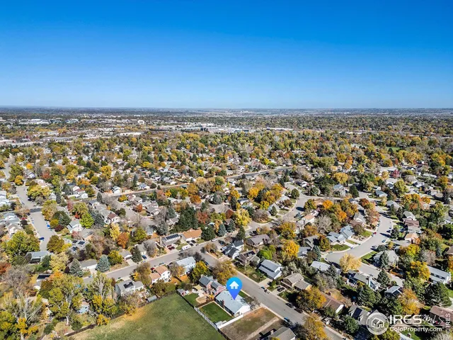 an aerial view of a city and ocean view