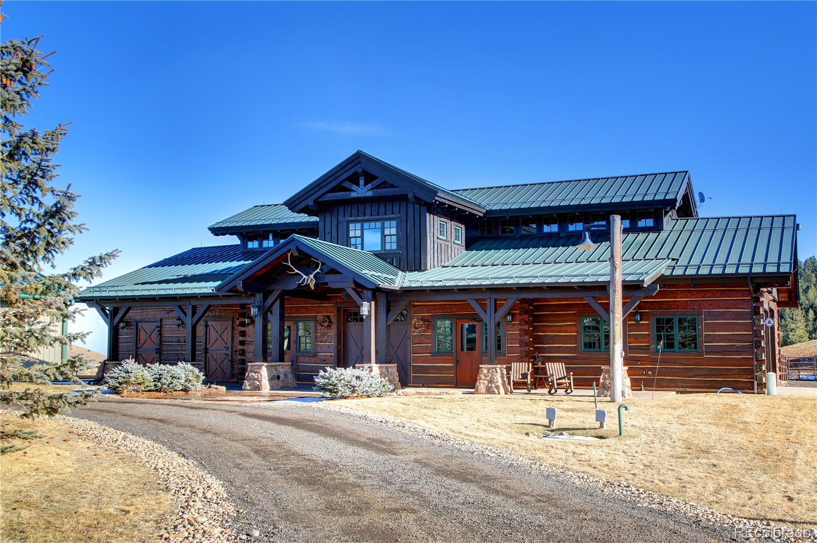 1334 South Grapevine Road Golden, CO 80401 - Photo 17 of 36 a front view of a house with a porch