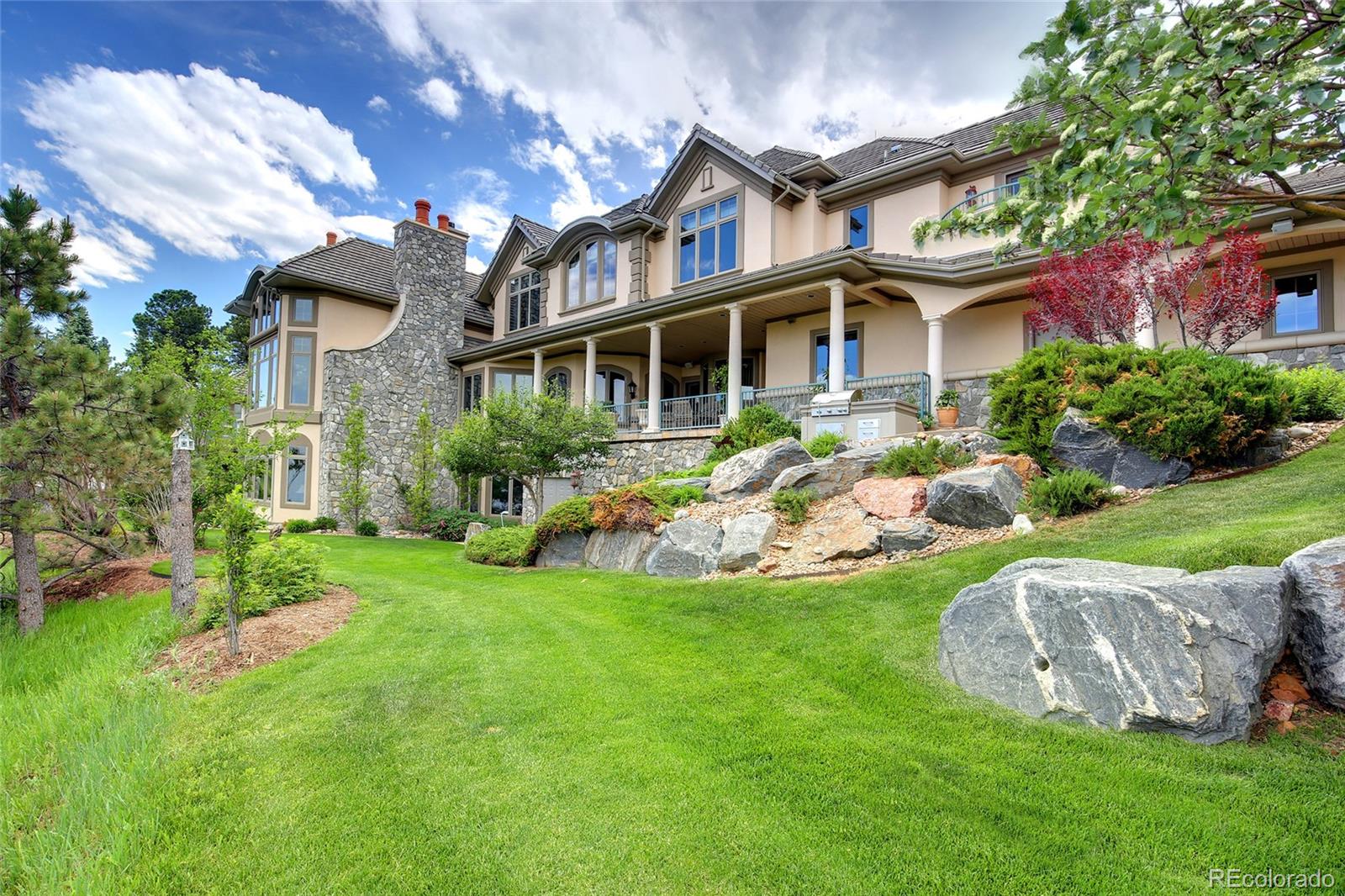 1334 South Grapevine Road Golden, CO 80401 - Photo 2 of 36 a front view of house with yard and outdoor seating