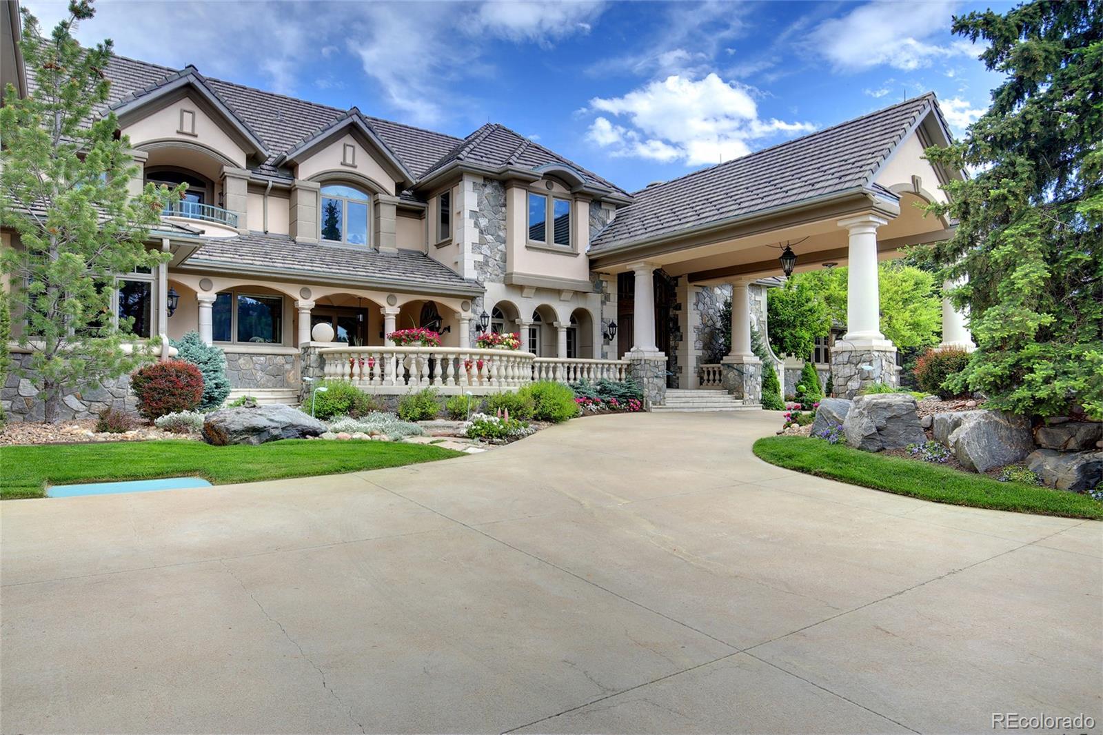 1334 South Grapevine Road Golden, CO 80401 - Photo 3 of 36 a front view of a house with garden