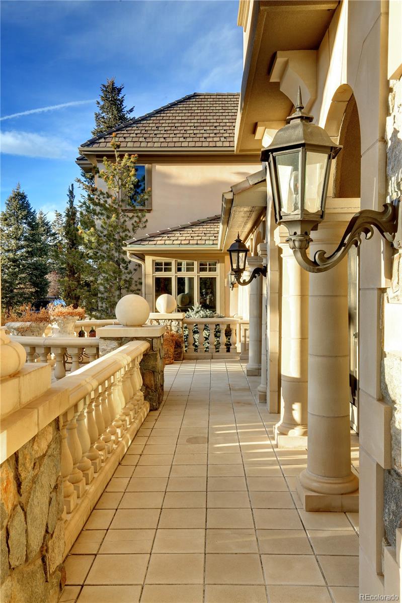 1334 South Grapevine Road Golden, CO 80401 - Photo 4 of 36 a view of a chairs and table on the balcony