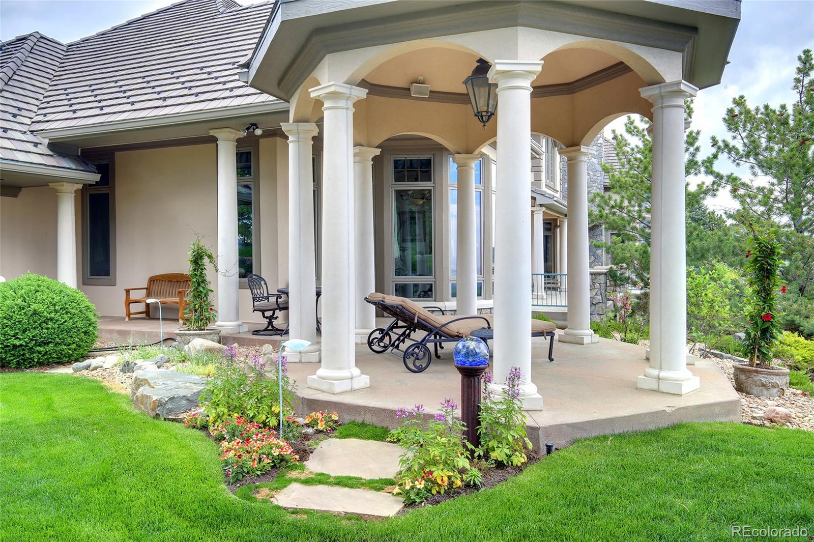 1334 South Grapevine Road Golden, CO 80401 - Photo 5 of 36 a front view of a house with garden