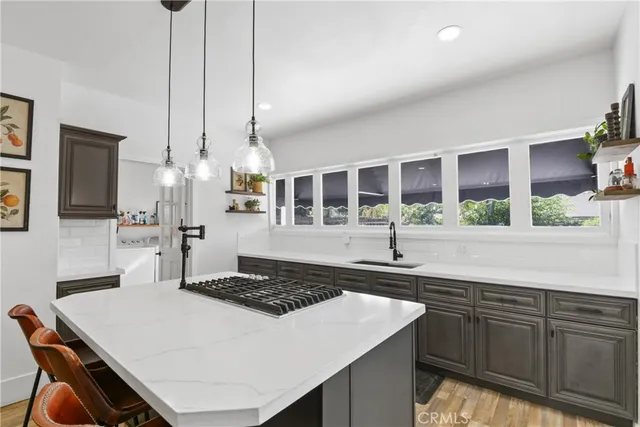 a kitchen with a table and chairs
