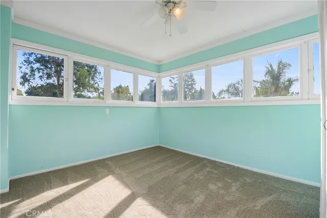 a view of a room with a large window