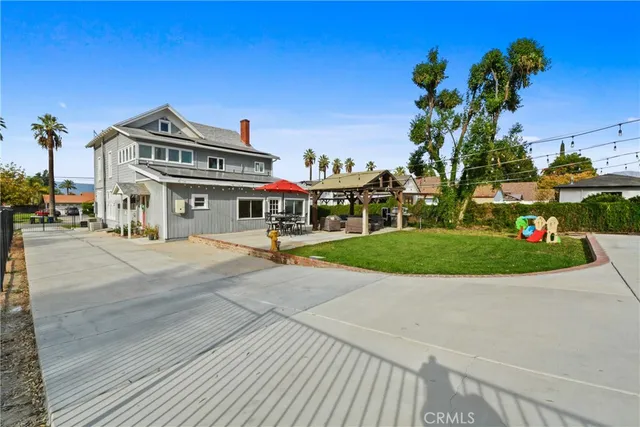a view of a street with a building in the background