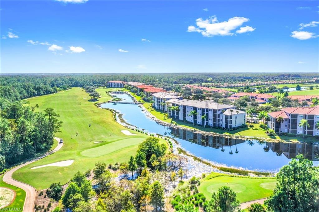 10329 Heritage Bay Boulevard, Unit 1641 Naples, FL 34120 - Photo 22 of 22 Bird's eye view of a local golf course and a large body of water