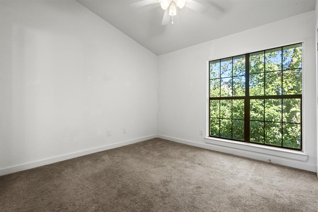 2806 Knight Street, Unit 103 Dallas, TX 75219 - Photo 11 of 17 an empty room with a window