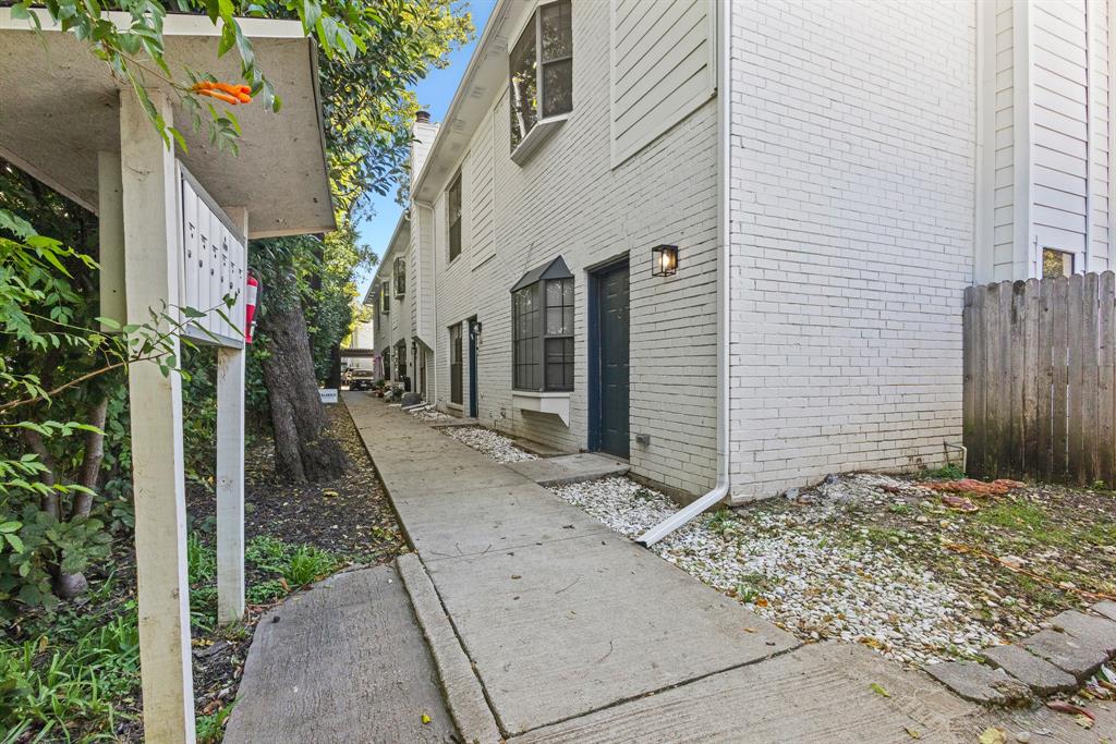 2806 Knight Street, Unit 103 Dallas, TX 75219 - Photo 15 of 17 a view of a pathway front of house
