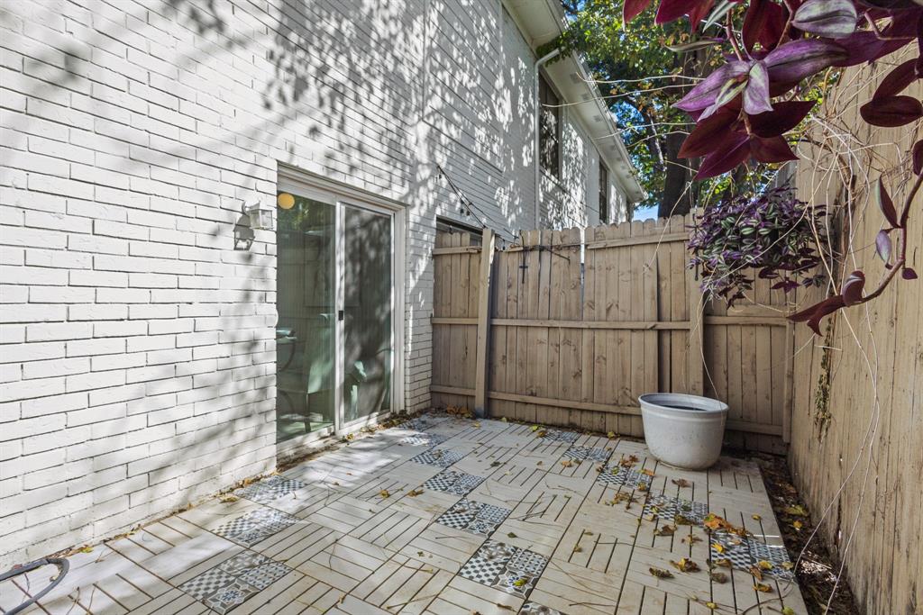 2806 Knight Street, Unit 103 Dallas, TX 75219 - Photo 16 of 17 a view of a backyard of a house with a sink