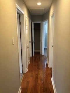 5204 State Road Burbank, IL 60459 - Photo 16 of 30 a view of a hallway with wooden floor and closet area