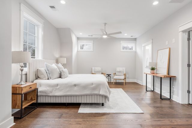 a bathroom with a sink double vanity and a mirror