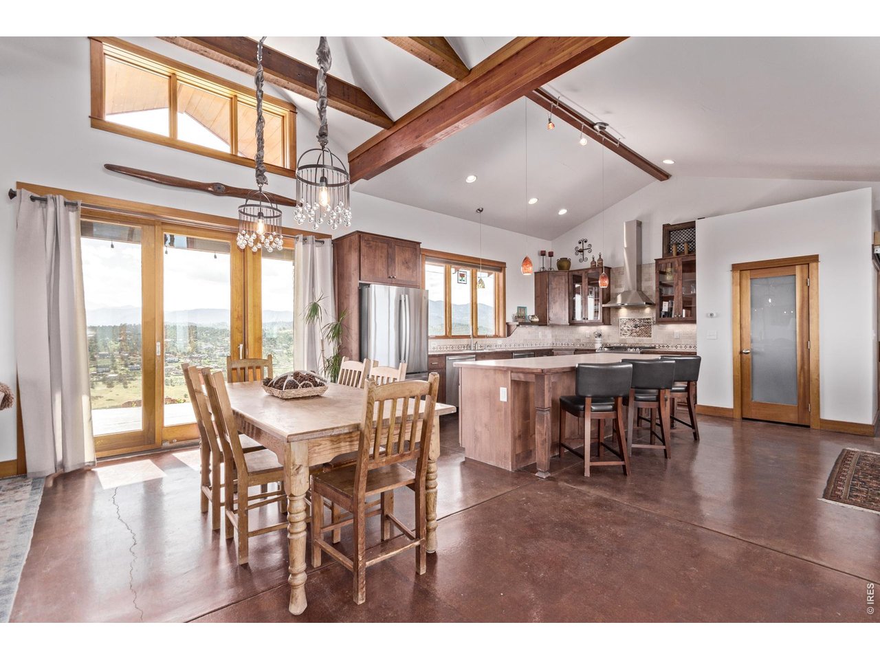 399 Northview Road Berthoud, CO 80513 - Photo 16 of 39 Open concept living with the gorgeous front range rocky mountains right out of your windows