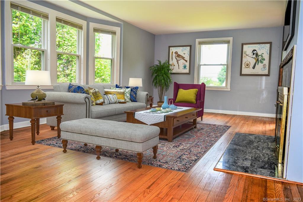 212 Wells Road Wethersfield, CT 06109 - Photo 1 of 1 a living room with furniture and a window